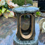 Grablaterne Granit Olive Höhe 23 cm/Ø 15 cm Bronze mit Kreuz